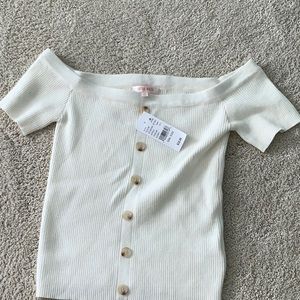 Off white top from PacSun by Lottie Moss